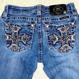 Size 25 Miss Me relaxed bootcut jeans.
